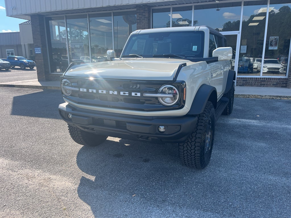2025 Ford Bronco Outer Banks in Desert Sand — front three-quarter view