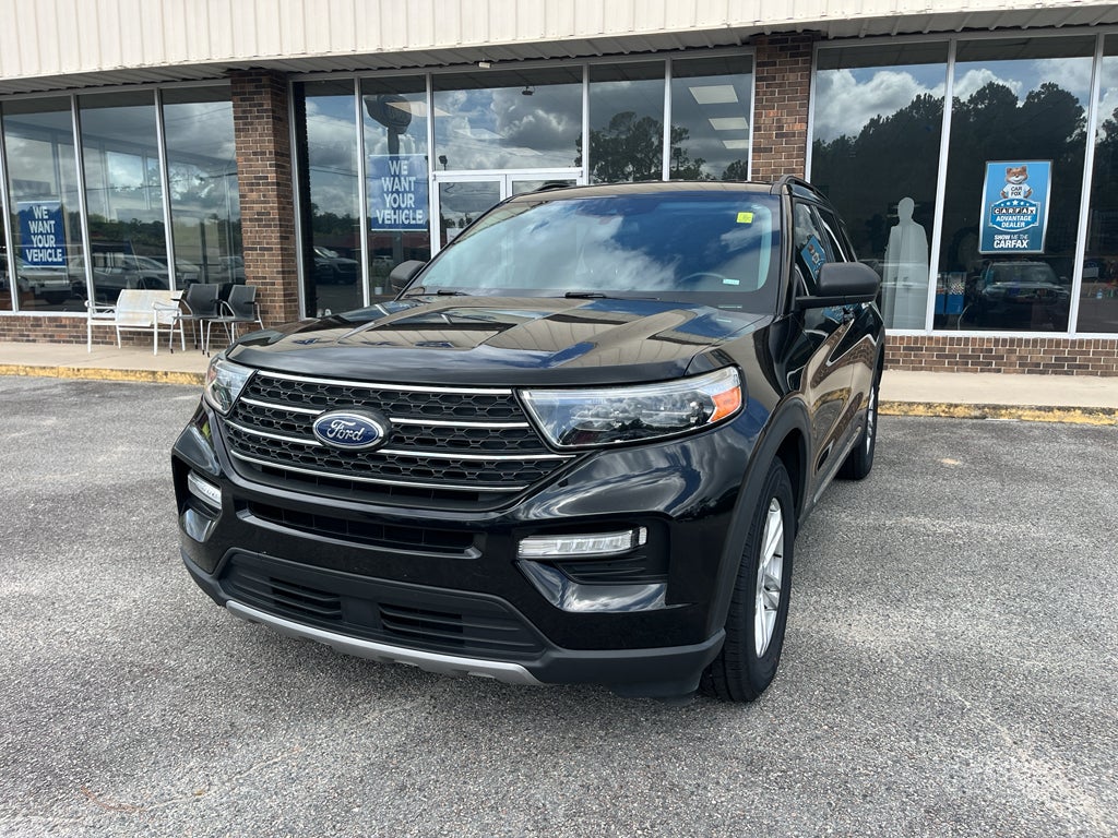 2023 Ford Explorer XLT in Agate Black Metallic — front three-quarter view