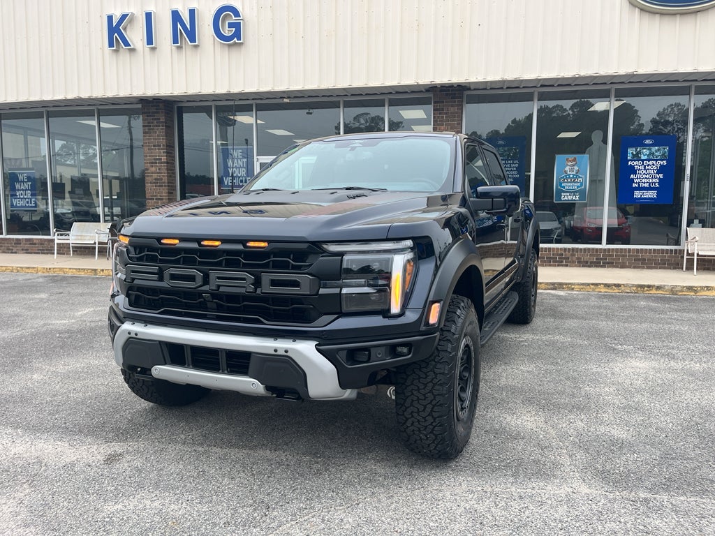 2026 Ford F-150 Raptor in Antimatter Blue Metallic — front three-quarter view
