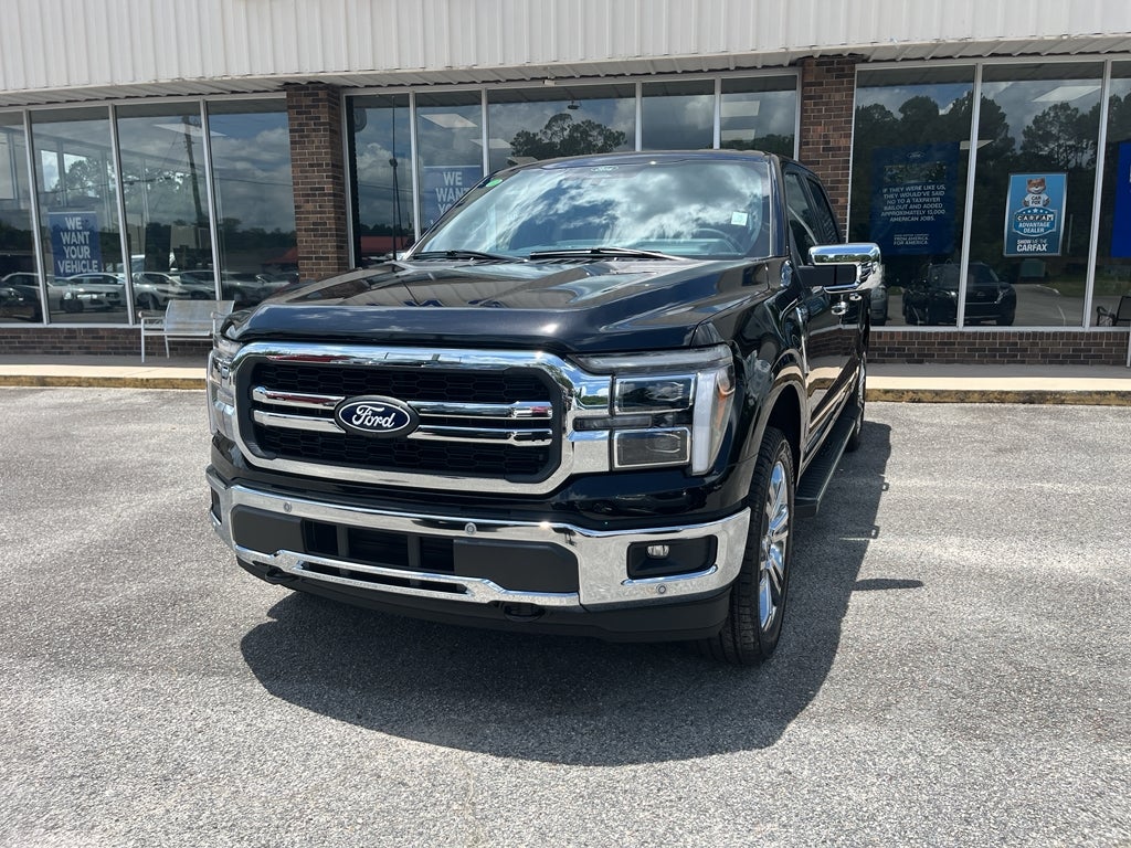 2025 Ford F-150 LARIAT in Agate Black Metallic — front three-quarter view